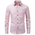 Detailed front presentation of a light pink long-sleeved button-down dress shirt - M / Tops / Pink