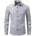 A full front view of a professional grey long-sleeve business dress shirt with black buttons - Gray