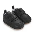 Detailansicht der schwarzen Baby-Lauflernschuhe mit doppeltem Klettverschluss - Innenlänge 11cm / Schwarz