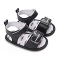Close-up of black baby sandals with cartoon crocodile and soft sole for 1-year-olds - Dark Blue