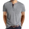 Close-up of a grey short-sleeve men's Henley shirt featuring a chest pocket and buttons - S / Tops / Light Gray