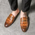Stylish men's brown crocodile texture mule loafers with elegant golden metal buckle detail - Dark Brown