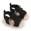 Schwarze Babysandalen für Mädchen mit Quasten und Schleife, weiche Sohle - Schwarz