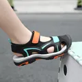 Closed-toe breathable boys' sport sandals featuring mesh fabric and durable anti-slip rubber soles - 28 / Black Orange (hx807)