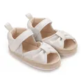 Close-up of baby soft-sole sandals in shimmering silver with espadrille detail - Silver