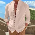 Close-up view of a men's loose linen casual long sleeve shirt with vintage button details - Pink