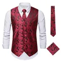 Detailed view of red and black paisley men's waistcoat with matching tie and pocket square - Red