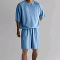Close-up of men's casual light blue terry crew neck short sleeve and shorts set. - S / Top And Bottom / Light Blue