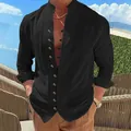 Detailed view of a men's retro black linen button-up shirt in a casual loose fit - Black