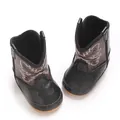 Gros plan de bottes de cowboy pour bébé avec broderies blanches et cuir bicolore - Longueur Intérieure 12cm / Noir