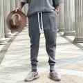 Men's hip-hop style grey knit jacquard trousers with adjustable drawstring waist - S / Bottoms / Light Gray