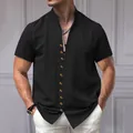 Men's vintage black linen short sleeve shirt featuring stand collar and amber buttons - S / Tops / Black