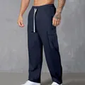 Men's loose navy blue corduroy cargo pants with drawstring and side pocket - S / Bottoms / Navy Blue