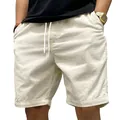 Close-up of men's cream corduroy casual shorts showing drawstring waist and texture - S / Bottoms / Apricot