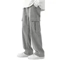 Detail view of grey corduroy cargo pants with wide leg and side flap pockets - S / Bottoms / Light Gray
