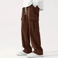 Detailed view of brown corduroy cargo pants with wide leg and loose fit for men - S / Bottoms / Wine Red