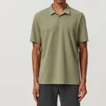 Men's loose breathable cotton sports Polo shirt shown in elegant olive green color - Bamboo Green
