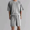 Comfortable men's gray French Terry lounge set with oversized t-shirt and shorts - S / Top And Bottom / Light Gray