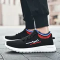 Comfortable black breathable knit slip-on sneakers for men featuring sporty striped collar - 36 / Black Red