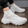 Detailed side view of premium white high-top flyknit breathable sport sneakers. - White