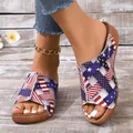 Detail of women's summer wedge sandals with stylish American flag star and stripe print design. - 36 / Blue