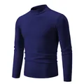 Jersey de punto azul marino de corte entallado con cuello alto y puños acanalados finos. - Azul marino