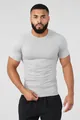 Detail view of men's light grey compression shirt for gym muscle training sessions - M / Tops / Silver