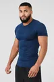 Detail view of men's high-elastic blue compression t-shirt for professional gym training - M / Tops / Dark Blue