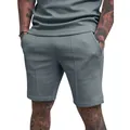 Detail view of men's plain grey casual fitness sports shorts with side pockets - Iron Grey