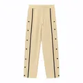 Beige men's lounge pants featuring side black stripes and metal snap buttons - S / Khaki