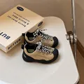 Close-up of children's tan toddler sports shoes with checkered laces and black soles - Size 23 (Insole 14.5cm, Foot Length 13.5-14cm) / Black