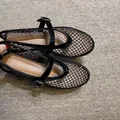 Black mesh Mary Jane ballet flats featuring a breathable hollow design and buckle strap - 35 / Black