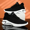 Black breathable fly-knit slip-on sneakers with chunky white sole, lightweight design - 36 / Black and White