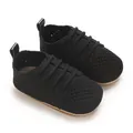 Detailed view of black knitted infant flat shoes with breathable hollow-out design - 11cm / Black