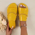 Detail view of yellow crocodile embossed flat sandals with gold chain decoration - 36 / Yellow