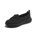 Women's black slip-on casual walking shoes with breathable knit upper and thick sole - 35 / Black (1038)