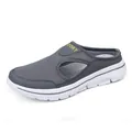 Grey breathable mesh slip-on mule sneakers with white sole and sport detail. - 39 / Dark Gray