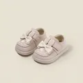 Adorable pink baby girl princess walker shoes featuring white bow and rabbit ear decor - Purple