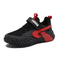 Boys breathable fly-knit sports shoes with lightweight sole and red accents. - 28 / Black