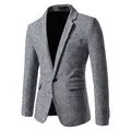 Detailed view of a men's slim fit blazer with a classic black and white houndstooth pattern. - M / Tops / Light Gray