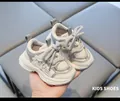 Detailed view of grey and white toddler sneakers with breathable mesh and non-slip soles - Size 19/Insole 14cm / Gray