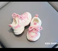 Close-up of pink and white toddler sports sneakers with soft non-slip soles - Size 19/Insole 14cm / Pink
