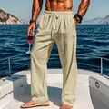 Detail view of men's breathable cotton linen loose casual trousers on luxury yacht - Khaki