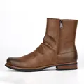 Macro side view detail of a brown pleated faux leather men's ankle boot with a zipper. - 40 / Coffee