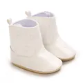 Close-up of elegant white baby boots with baby embroidery and heart detail on toe - White