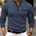 Detailed macro view of men's blue ribbed polo shirt featuring a quarter-zip collar design - S / Tops / Navy Blue