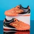 Vibrant orange and black children's turf soccer cleats with silver geometric mesh pattern - 31 / Orange