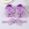 Macro detail of the purple infant shoe and headband set decorated with large mesh bows and pearls. - Size 11 (Inner Length 10.5cm) / Beaded Purple + Headband