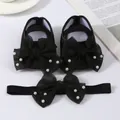 Detailed macro view of black baby shoe and matching headband set with mesh bows and pearls - Beaded Black + Headband