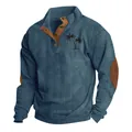 Detail of men's blue ribbed corduroy sweatshirt featuring a palm tree chest print - Denim Blue Pattern